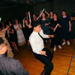 Guests filling the dance floor late in the evening